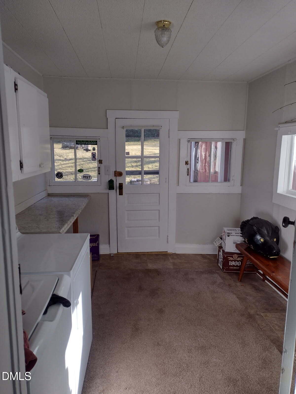 659 Chestnut Grove Road Spruce Pine, NC 28777 - Photo 20 of 21 a kitchen that has a sink and chair