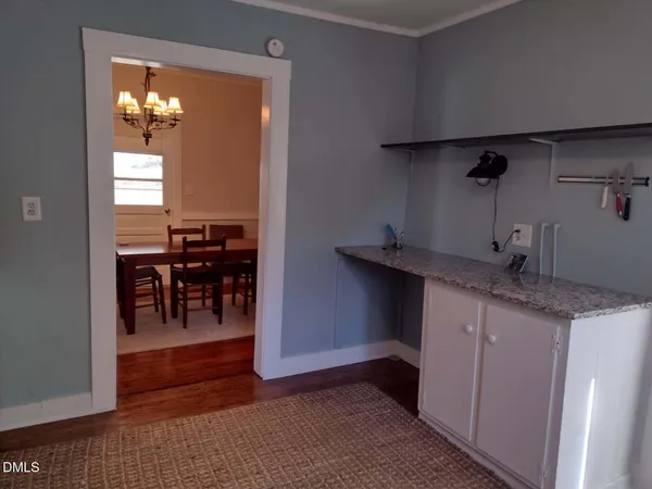 a bedroom with a bed and a closet