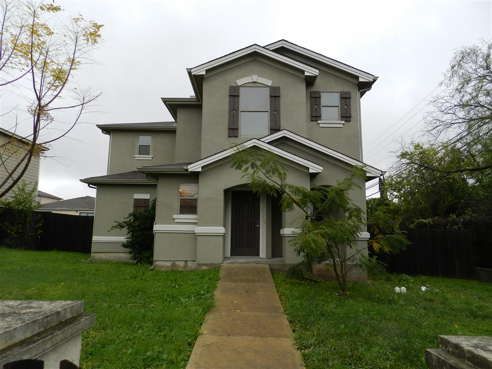 4707 Nuckols Crossing Road Austin, TX 78744 - Photo 1 of 1 a front view of house with yard and green space