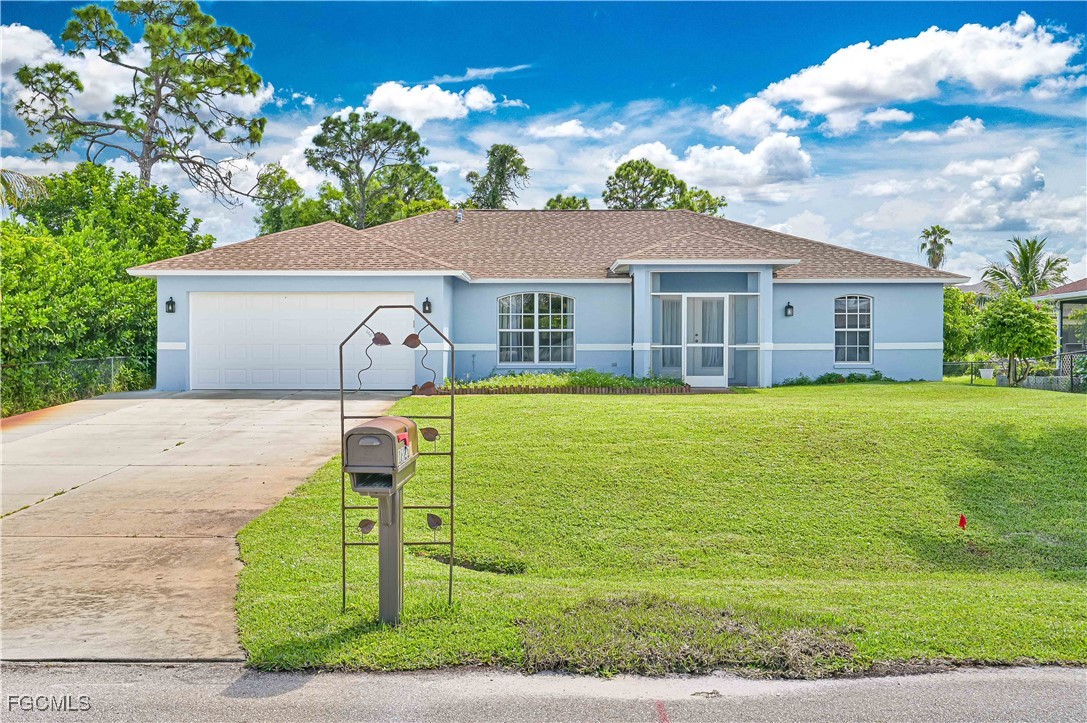 18217 Sycamore Road Fort Myers, FL 33967 - Photo 2 of 35 a house view with a garden space
