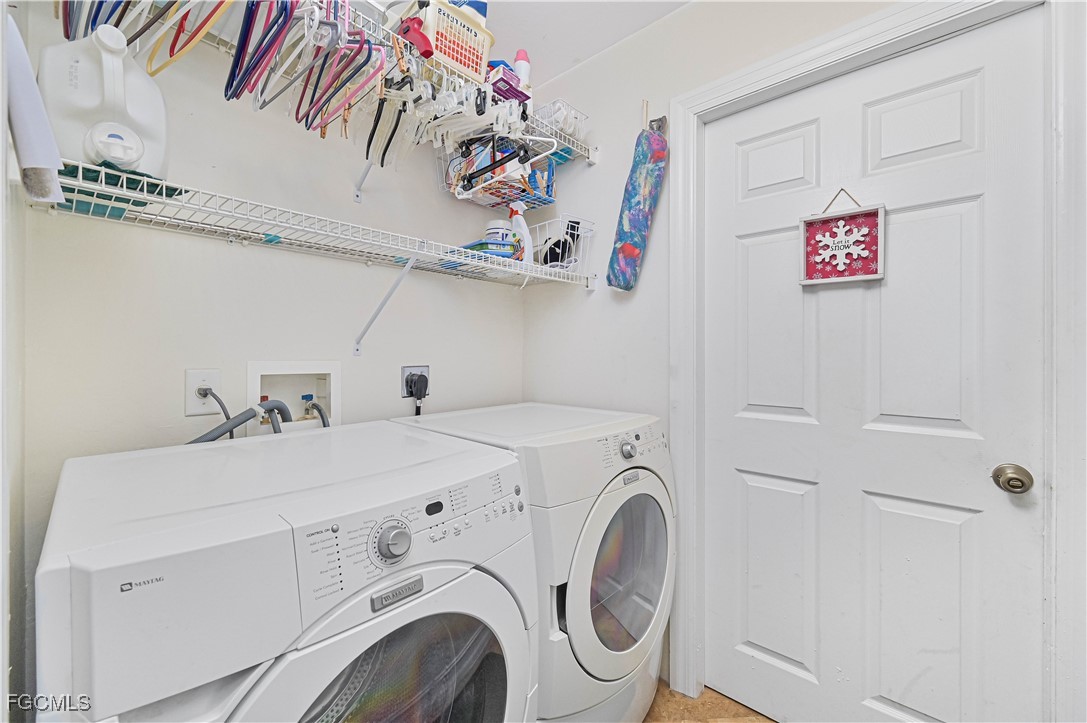 18217 Sycamore Road Fort Myers, FL 33967 - Photo 29 of 35 a utility room with dryer and washer