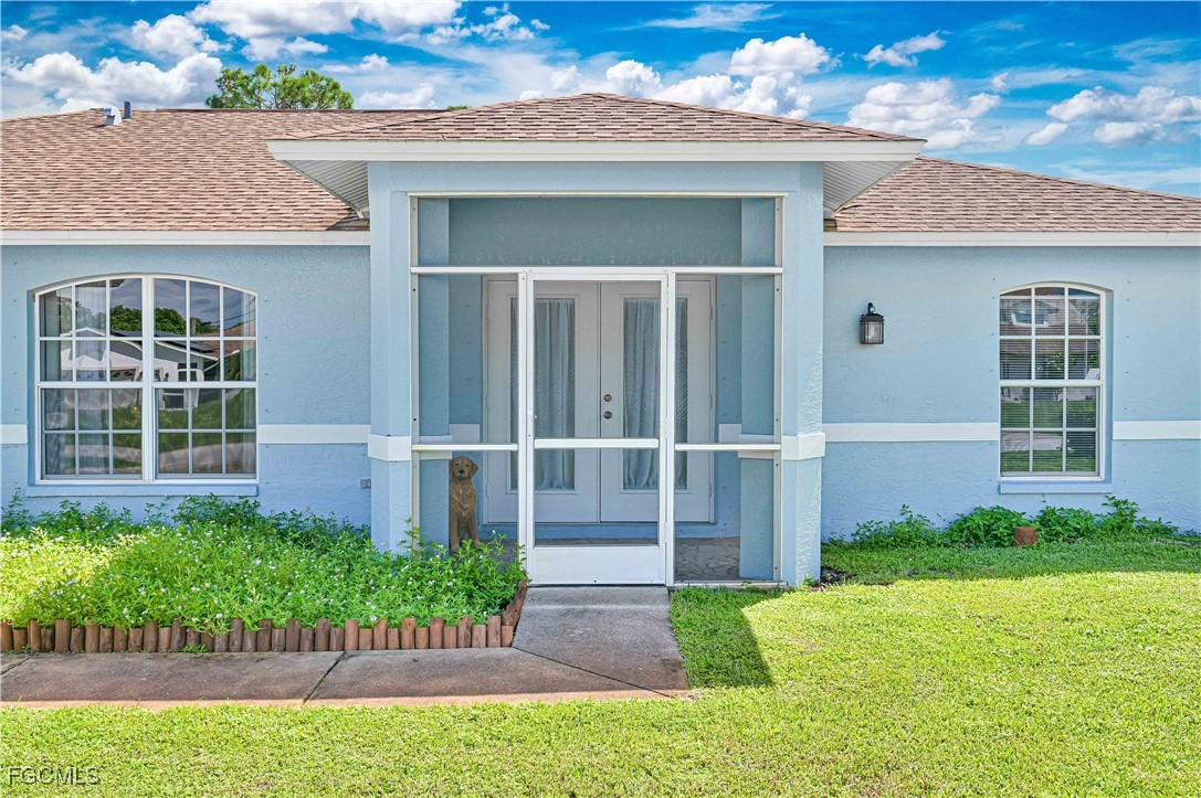 18217 Sycamore Road Fort Myers, FL 33967 - Photo 3 of 35 a house view with a garden space