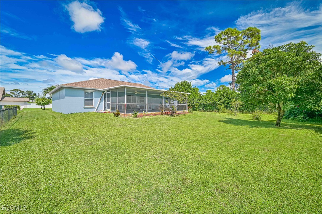 18217 Sycamore Road Fort Myers, FL 33967 - Photo 32 of 35 a view of a house with a big yard