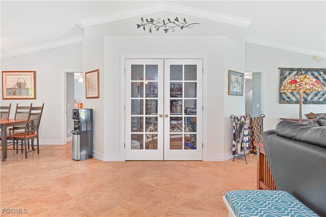 18217 Sycamore Road Fort Myers, FL 33967 - Photo 10 of 35 a livingroom with furniture entryway and wooden floor