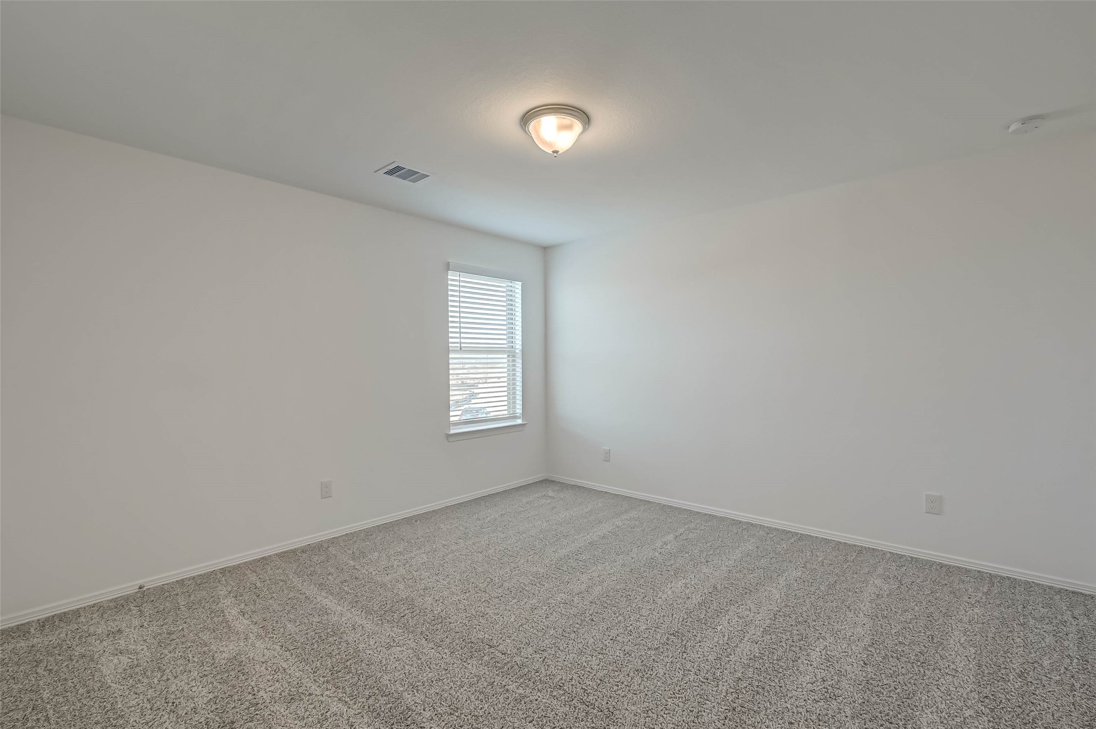 23226 Morning Splendor Drive Katy, TX 77493 - Photo 15 of 22 an empty room with a window