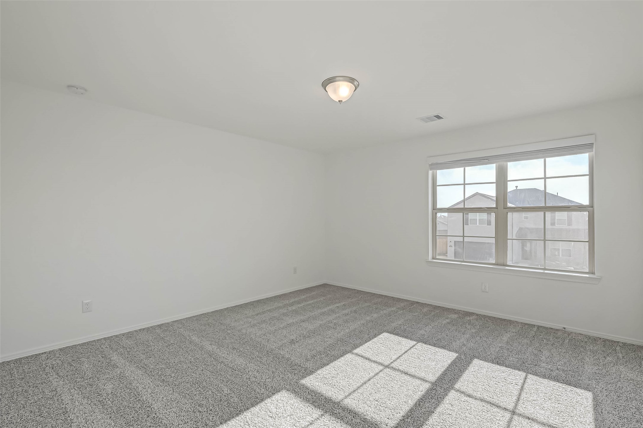 23226 Morning Splendor Drive Katy, TX 77493 - Photo 16 of 22 an empty room with a empty space and windows