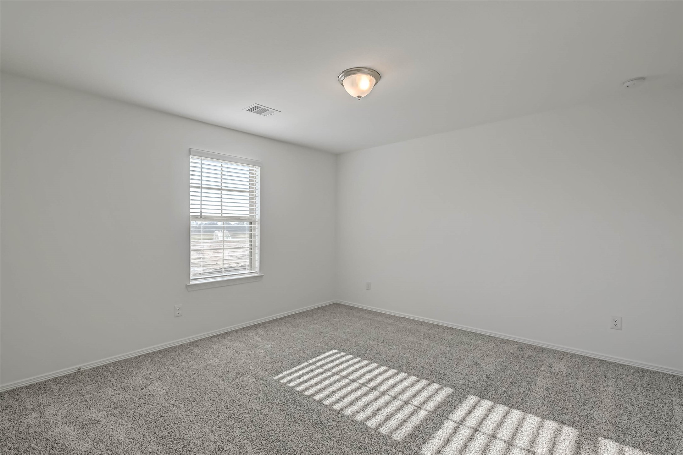 23226 Morning Splendor Drive Katy, TX 77493 - Photo 17 of 22 an empty room with a window