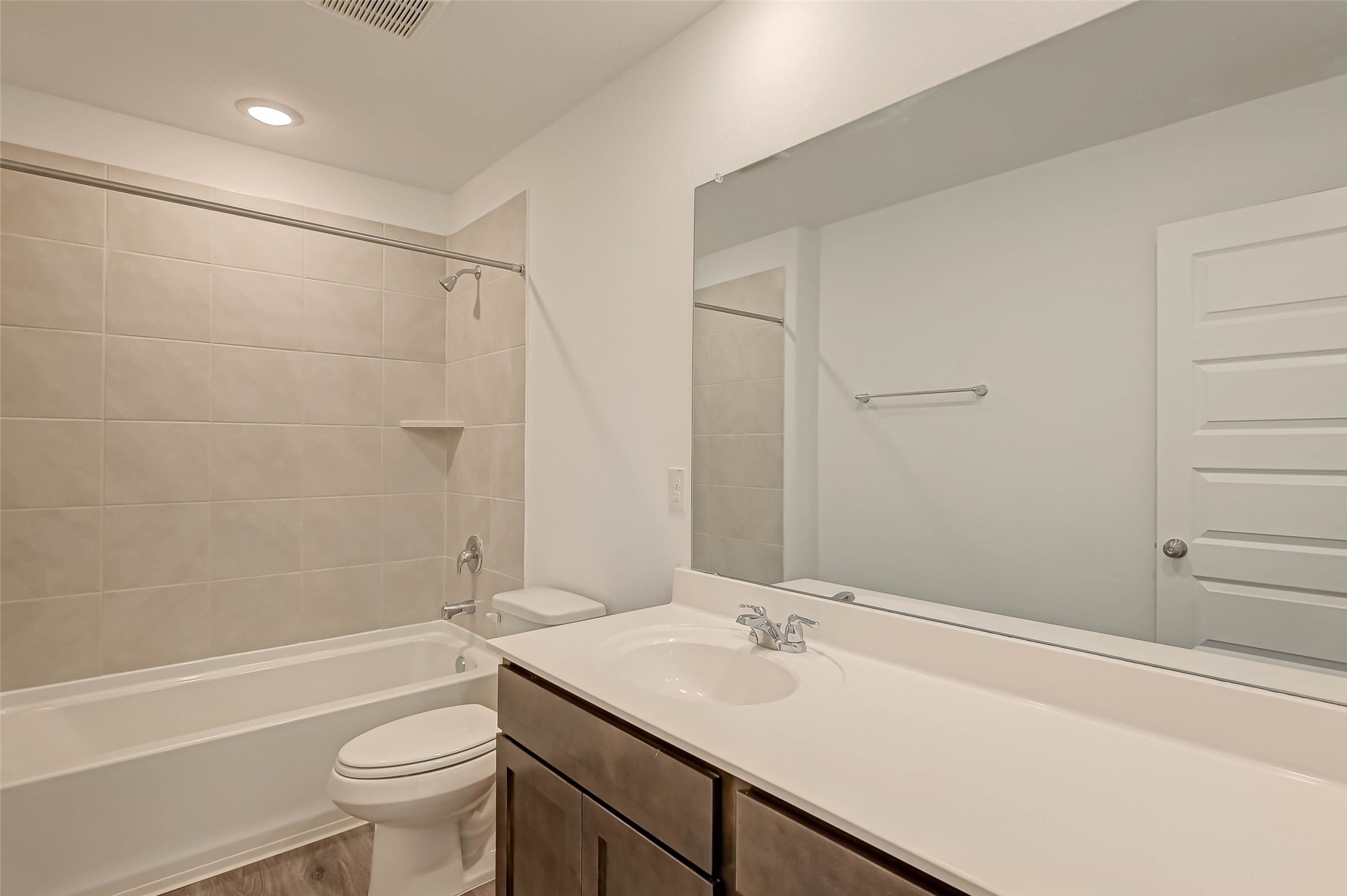 23226 Morning Splendor Drive Katy, TX 77493 - Photo 18 of 22 a bathroom with a sink toilet vanity and shower