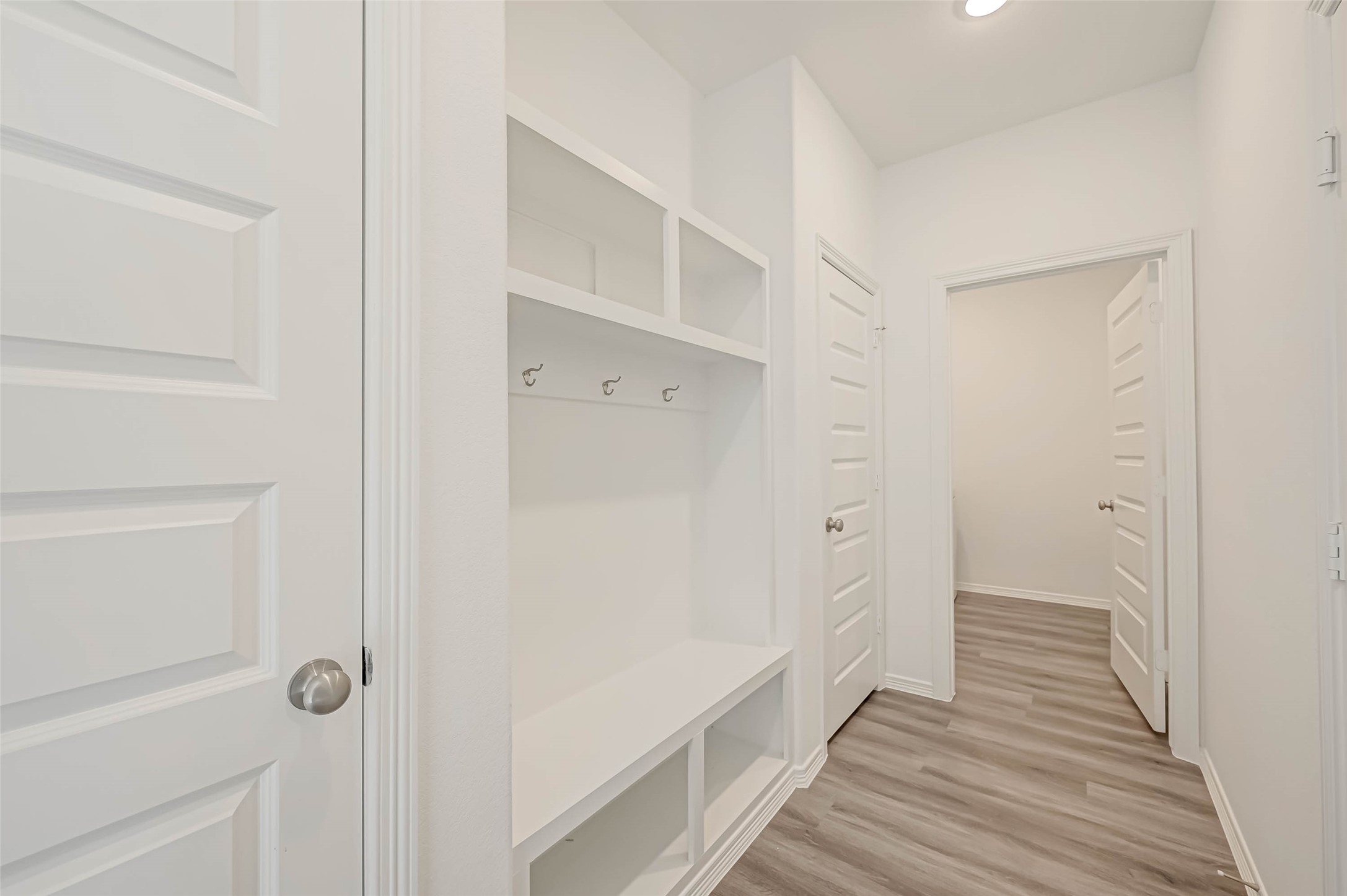 23226 Morning Splendor Drive Katy, TX 77493 - Photo 8 of 22 a view of a hallway with wooden floor