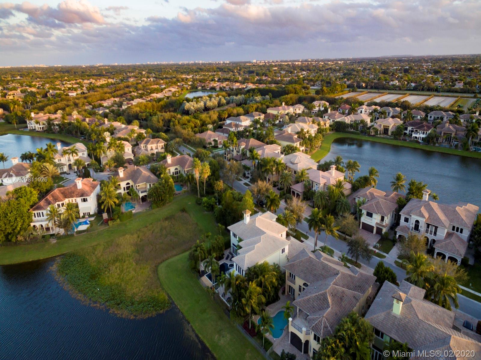 9597 Bridgebrook Drive Boca Raton, FL 33496 - Photo 11 of 37 an aerial view of residential houses with outdoor space