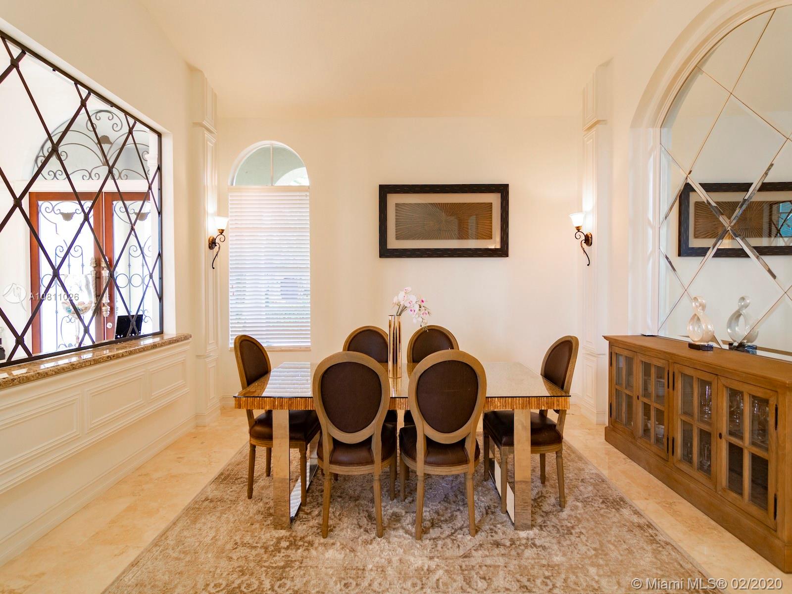 9597 Bridgebrook Drive Boca Raton, FL 33496 - Photo 12 of 37 a view of a dining room with furniture and window