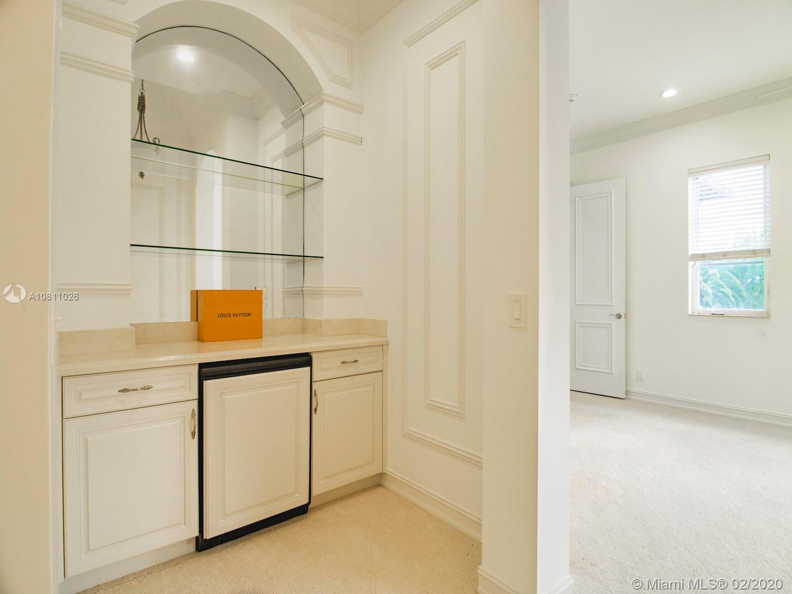 9597 Bridgebrook Drive Boca Raton, FL 33496 - Photo 18 of 37 a bathroom with a sink and a mirror