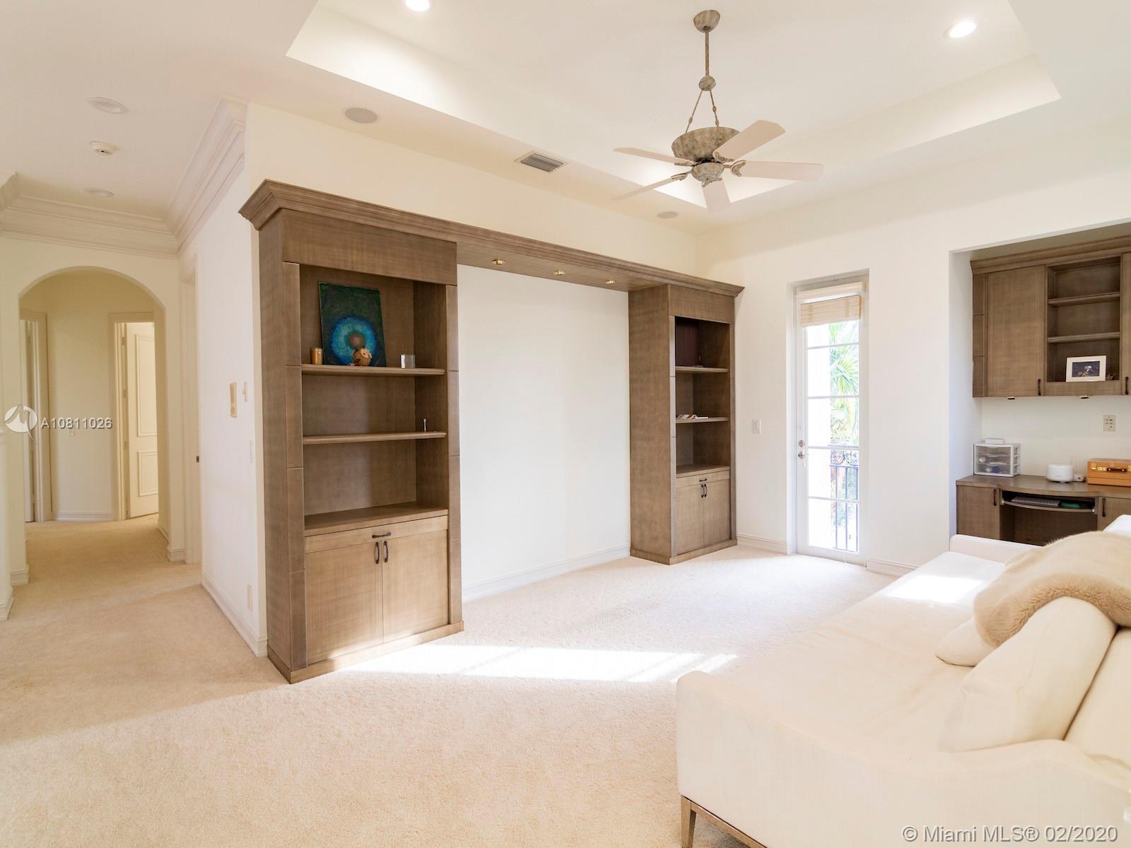 9597 Bridgebrook Drive Boca Raton, FL 33496 - Photo 22 of 37 a living room with furniture and a ceiling fan