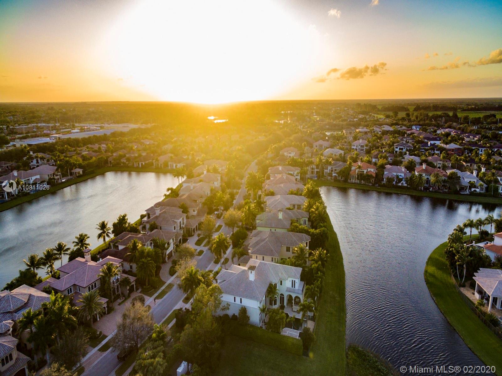 9597 Bridgebrook Drive Boca Raton, FL 33496 - Photo 35 of 37 an aerial view of residential houses with outdoor space and lake view