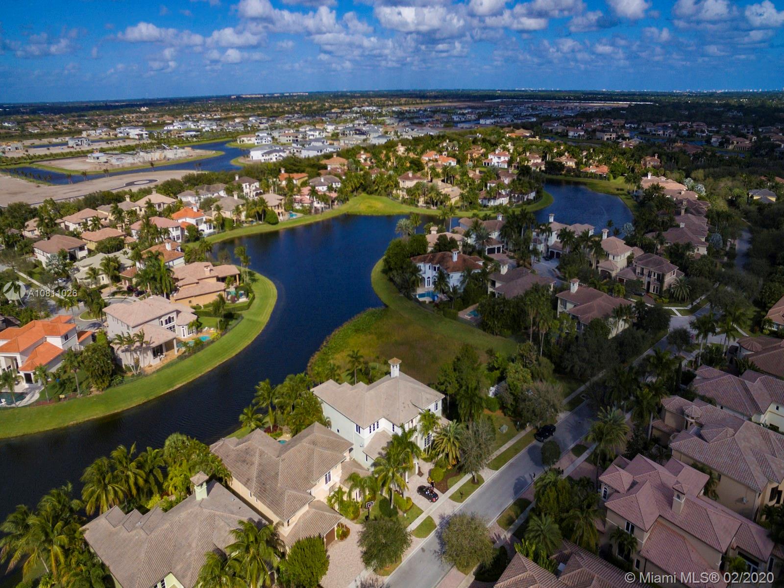9597 Bridgebrook Drive Boca Raton, FL 33496 - Photo 36 of 37 an aerial view of a house with a ocean view