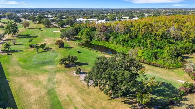 a view of a swimming pool with lake view
