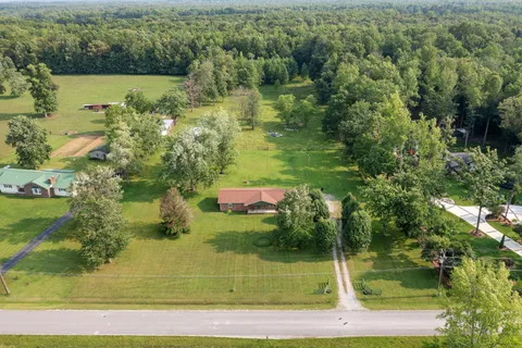 a view of a house with a big yard