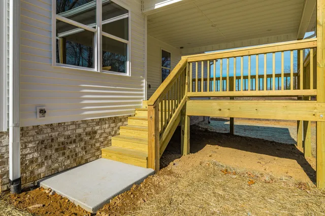 a view of entryway with a front door