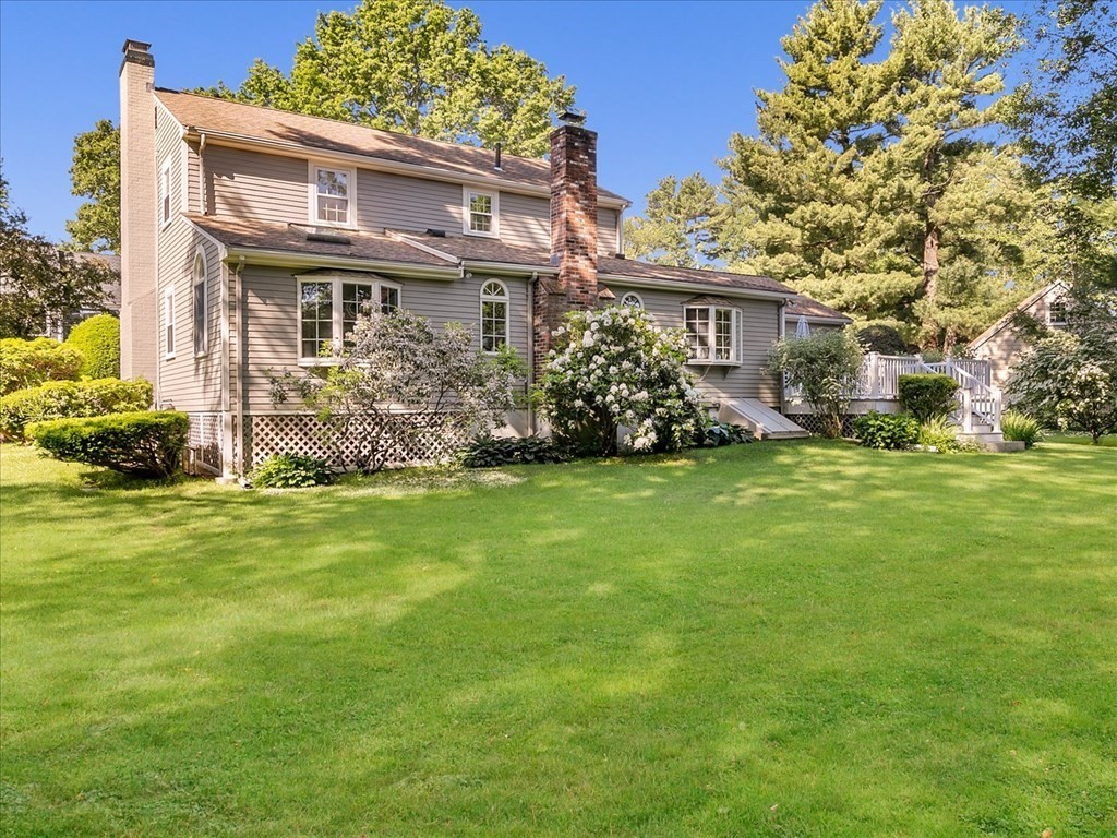 108 Meadowbrook Road Needham, MA 02492 - Photo 2 of 38 a front view of house with yard