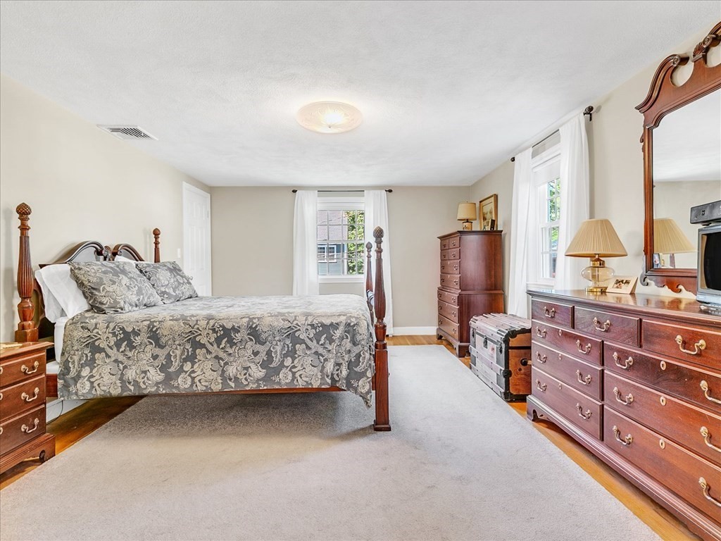 108 Meadowbrook Road Needham, MA 02492 - Photo 24 of 38 a bedroom with a bed dresser and a window