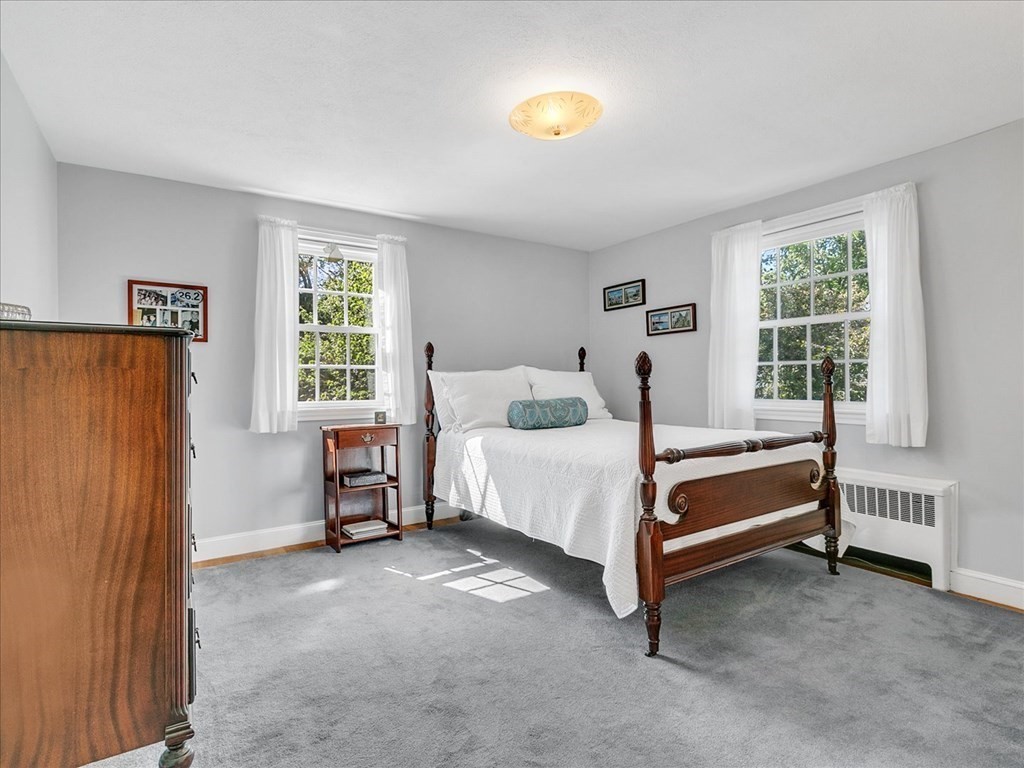108 Meadowbrook Road Needham, MA 02492 - Photo 27 of 38 a bedroom with a bed and a window