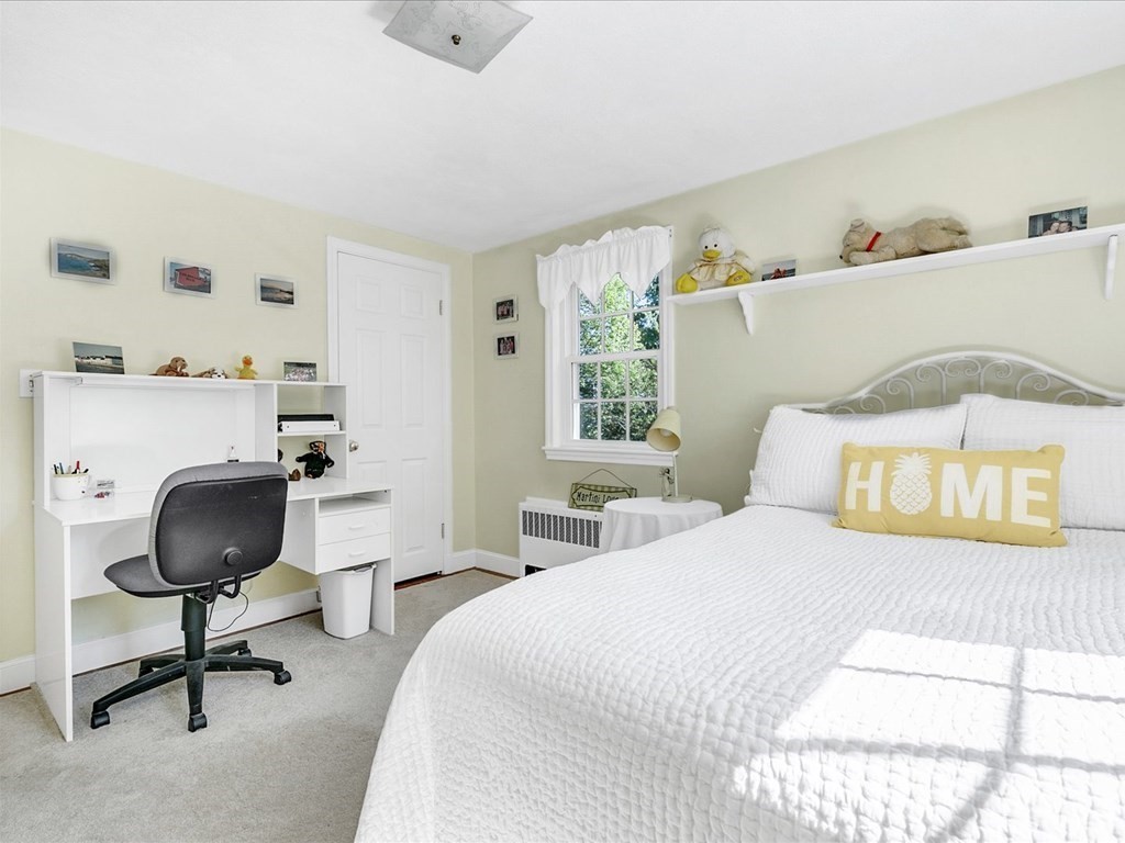108 Meadowbrook Road Needham, MA 02492 - Photo 30 of 38 a bedroom with a bed and a desk