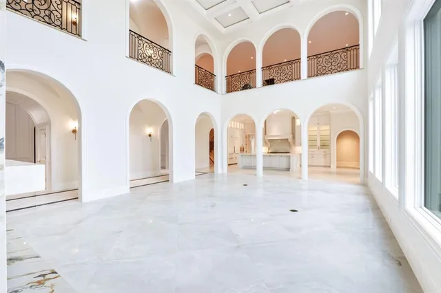 a view of hall with wooden floor