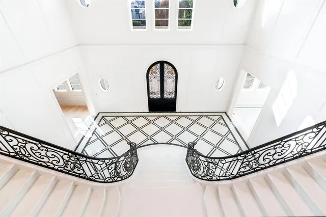 a view of a bench in wooden floor
