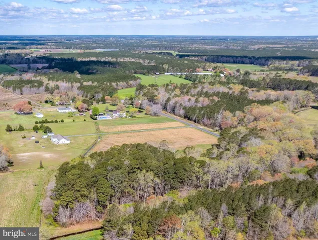 a view of a lake with a yard