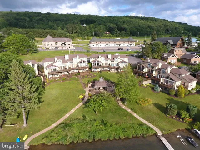 a view of a lake with a houses