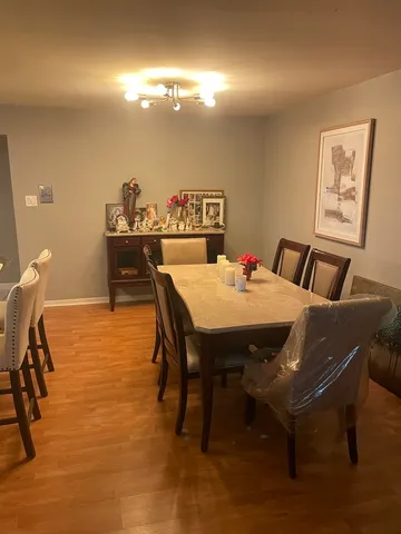 a view of a dining room with furniture