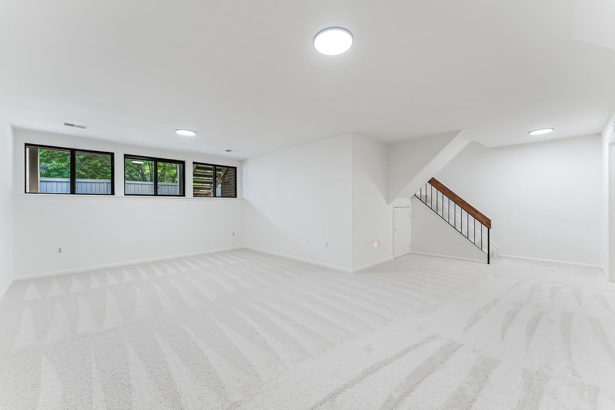 12023 Insha Court Reston, VA 20191 - Photo 7 of 52 an empty room with windows