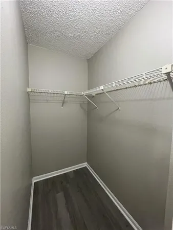 a view of a room with racks on the wall