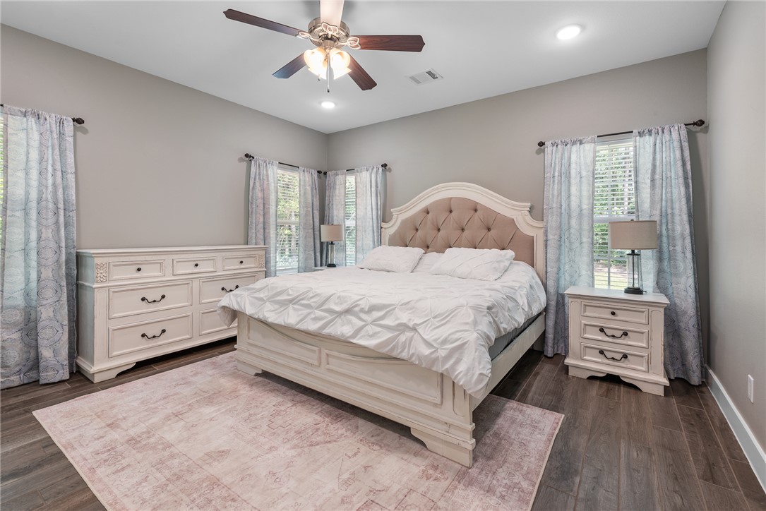 8729 Nathan Drive Waller, TX 77484 - Photo 28 of 48 Bedroom featuring dark wood-style floors, ceiling fan, and recessed lighting