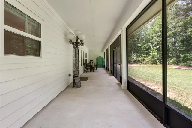 a view of a room with a large window