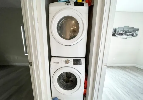 a utility room with dryer and washer