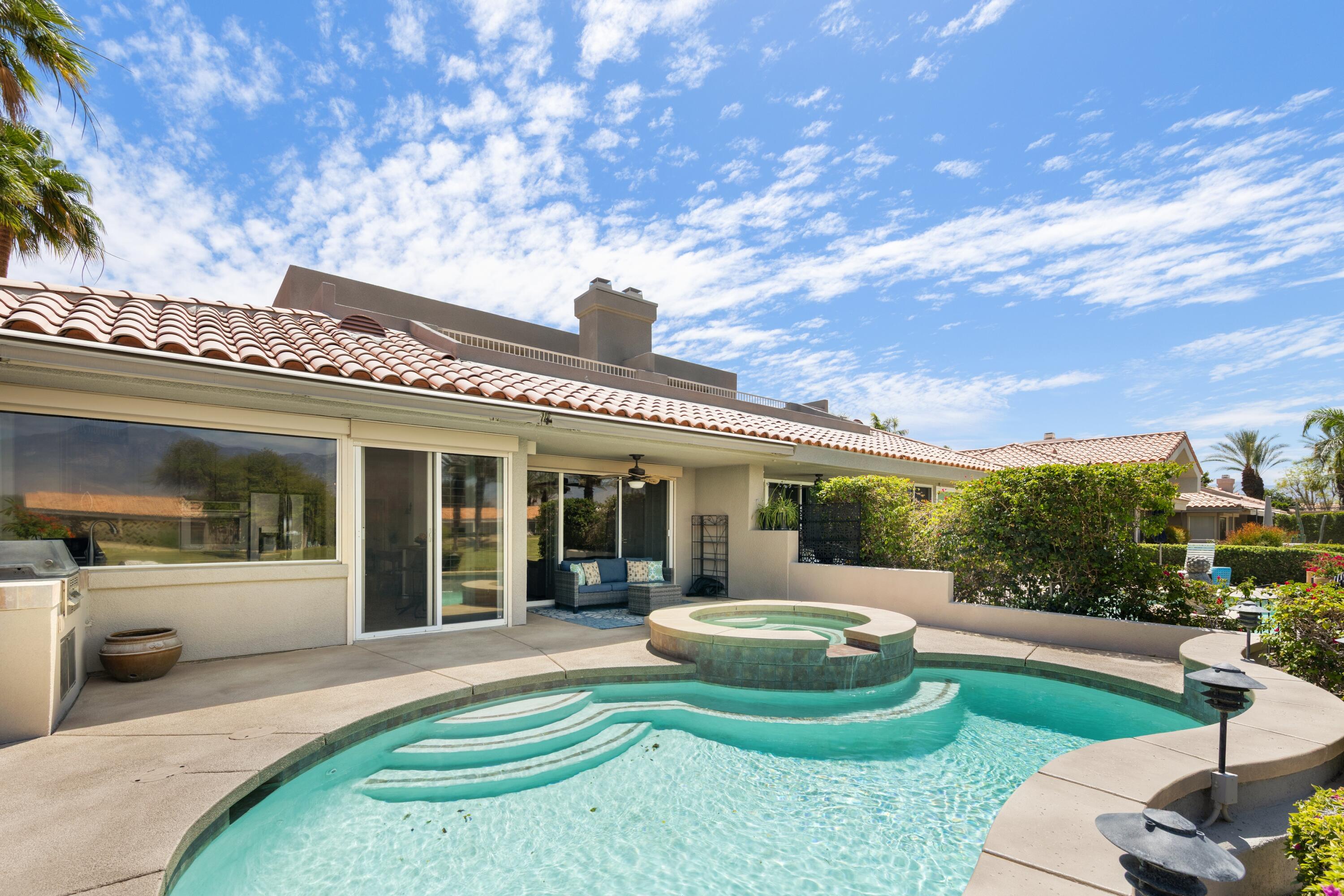 39 Augusta Drive Rancho Mirage, CA 92270 - Photo 49 of 53 a view of a house with furniture and garden