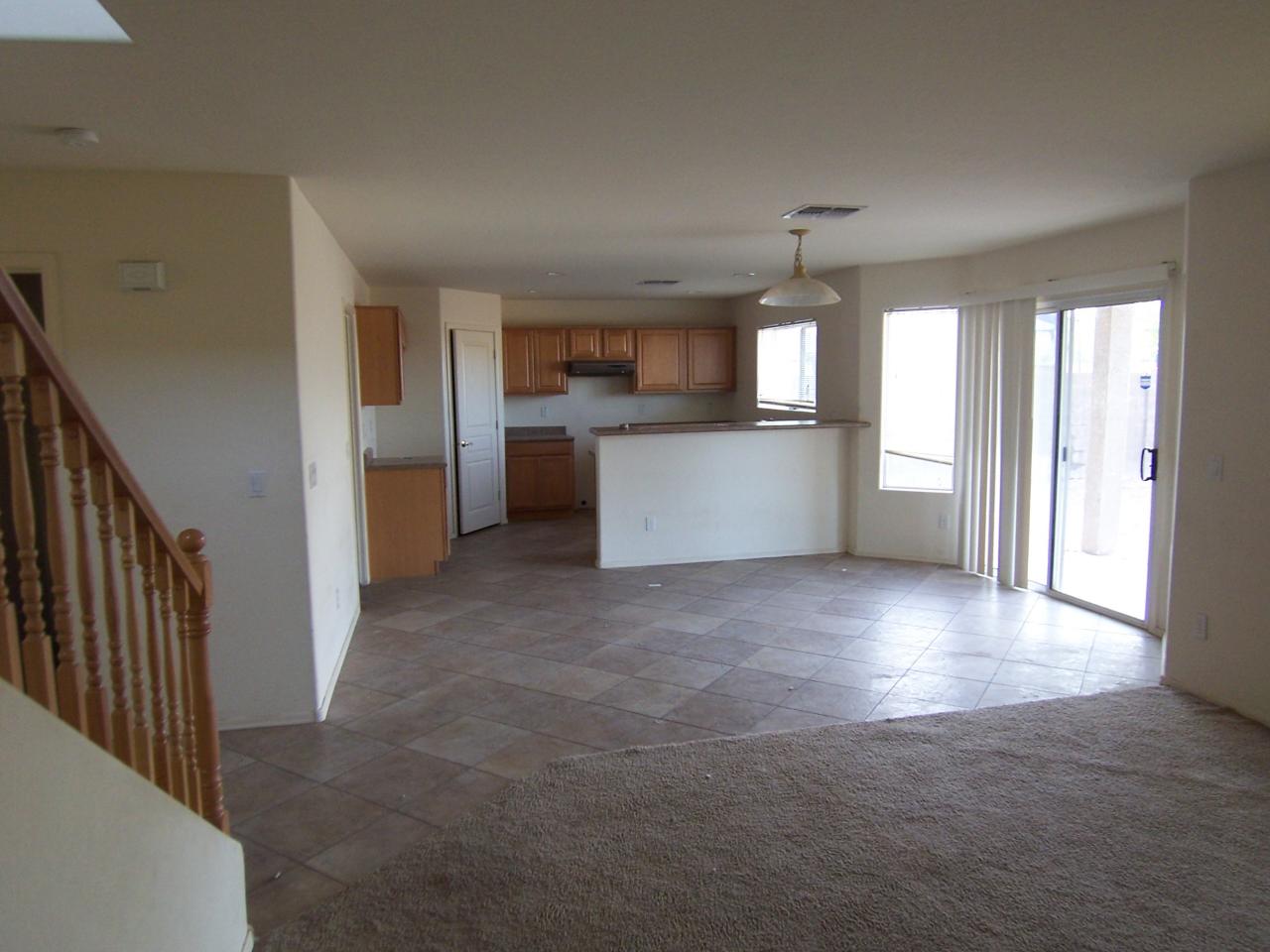 9138 West Payson Road Tolleson, AZ 85353 - Photo 3 of 7 Kitchen & Family Room