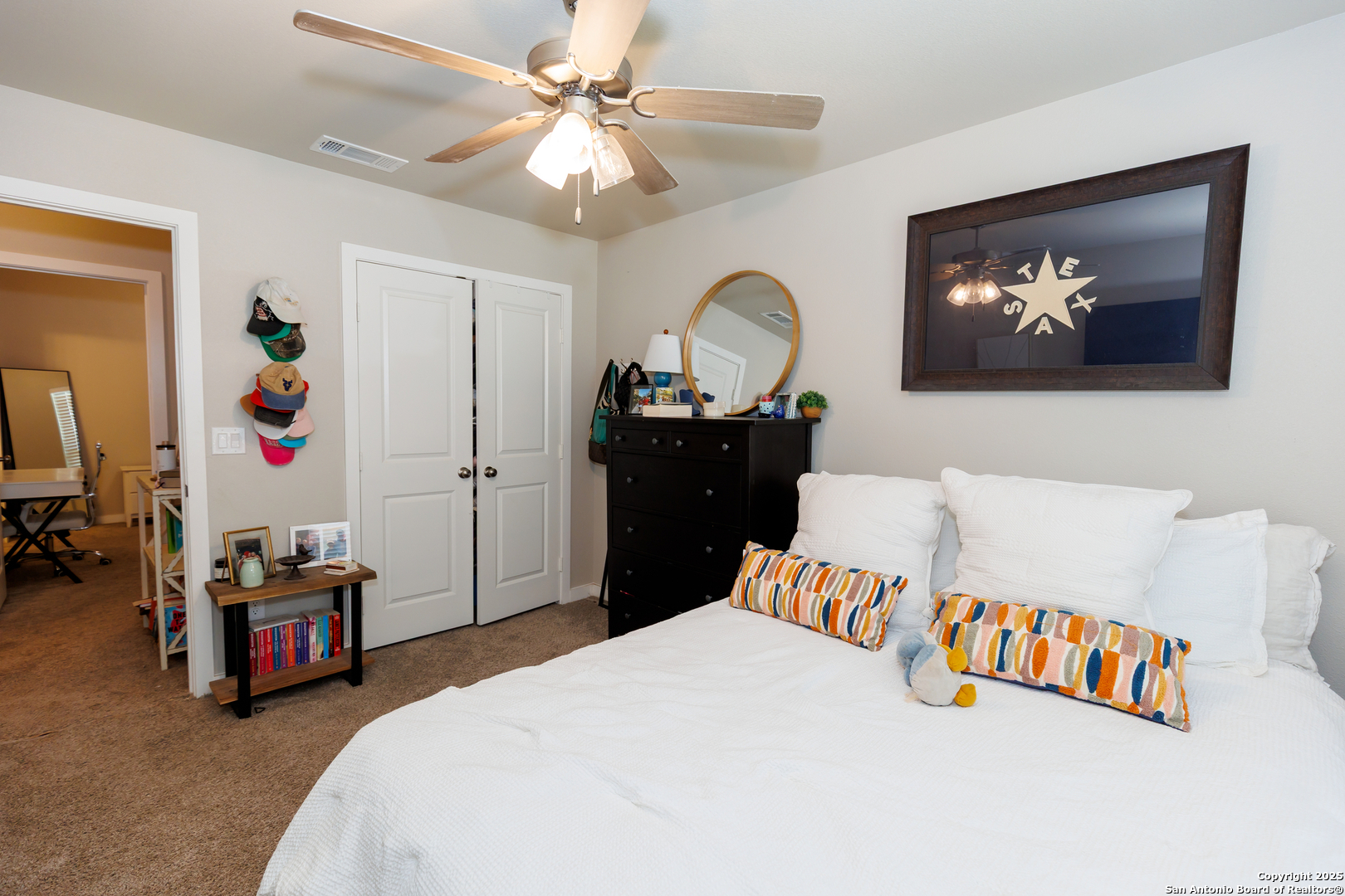 7419 29th Street Lubbock, TX 79407 - Photo 18 of 21 a bedroom with bed and furniture