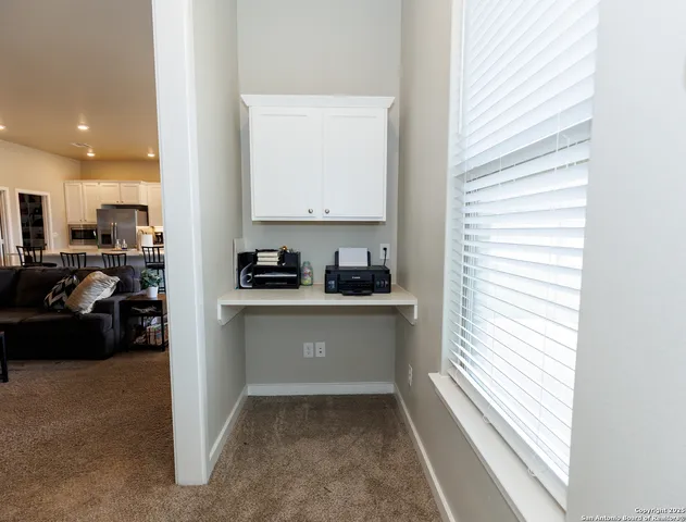 a view of a house with backyard