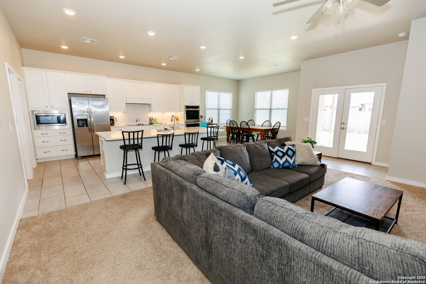 7419 29th Street Lubbock, TX 79407 - Photo 2 of 21 a living room with furniture and a large window