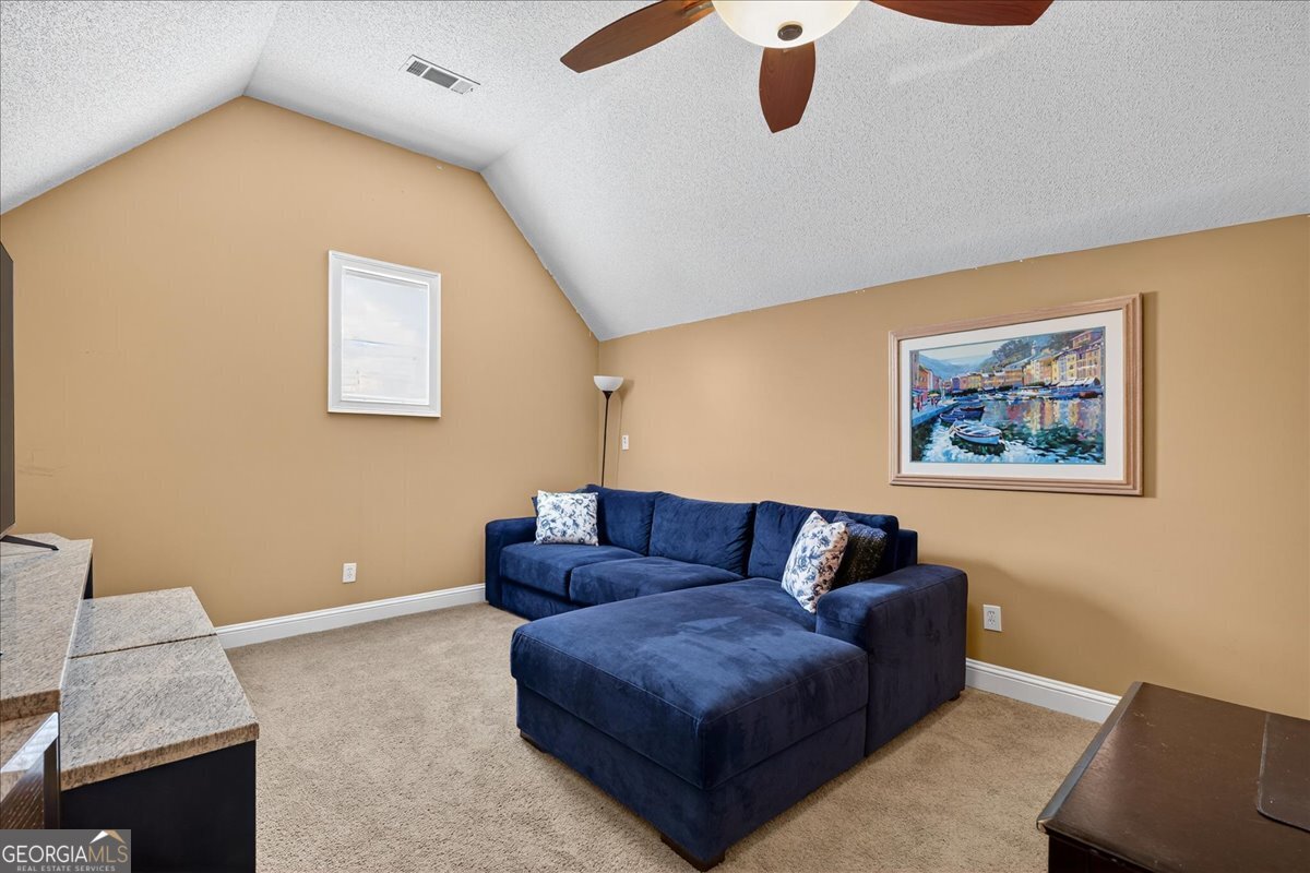 518 River Overlook Forsyth, GA 31029 - Photo 33 of 85 a living room with furniture and a window