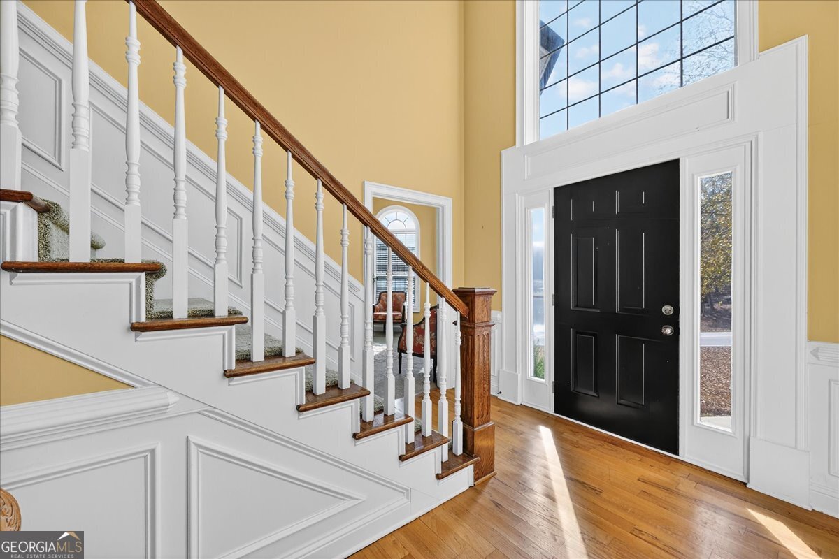 518 River Overlook Forsyth, GA 31029 - Photo 4 of 85 a view of entryway and hall with wooden floor