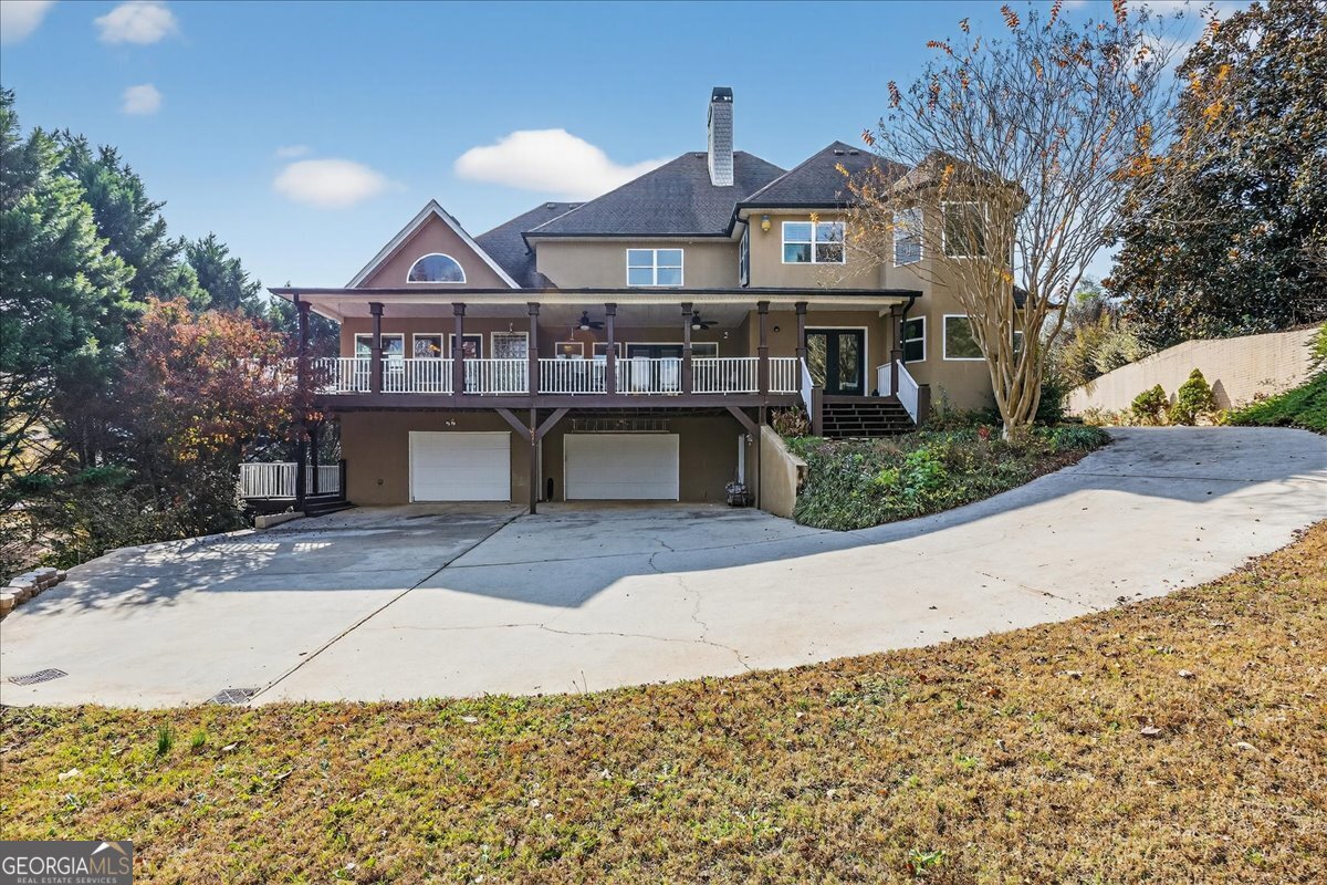 518 River Overlook Forsyth, GA 31029 - Photo 59 of 85 a front view of a house with a yard