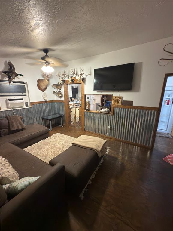 5500 South Chamberlain Pool Avenue Homosassa, FL 34448 - Photo 7 of 7 a bedroom with furniture and a flat screen tv