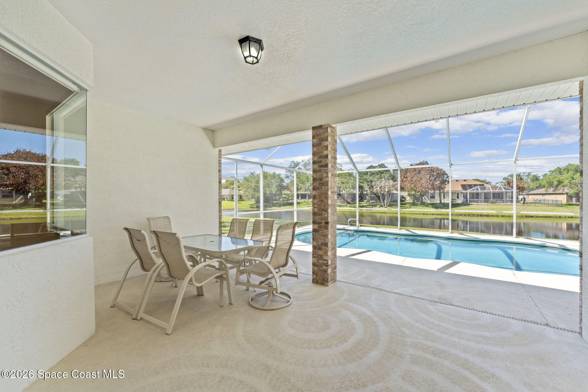1123 Spring Oak Drive Melbourne, FL 32901 - Photo 51 of 67 a view of a work space with wooden floor and furniture