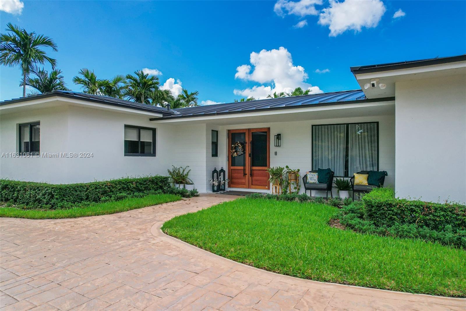 10900 Southwest 128th Street Miami, FL 33186 - Photo 1 of 34 a view of a house with patio