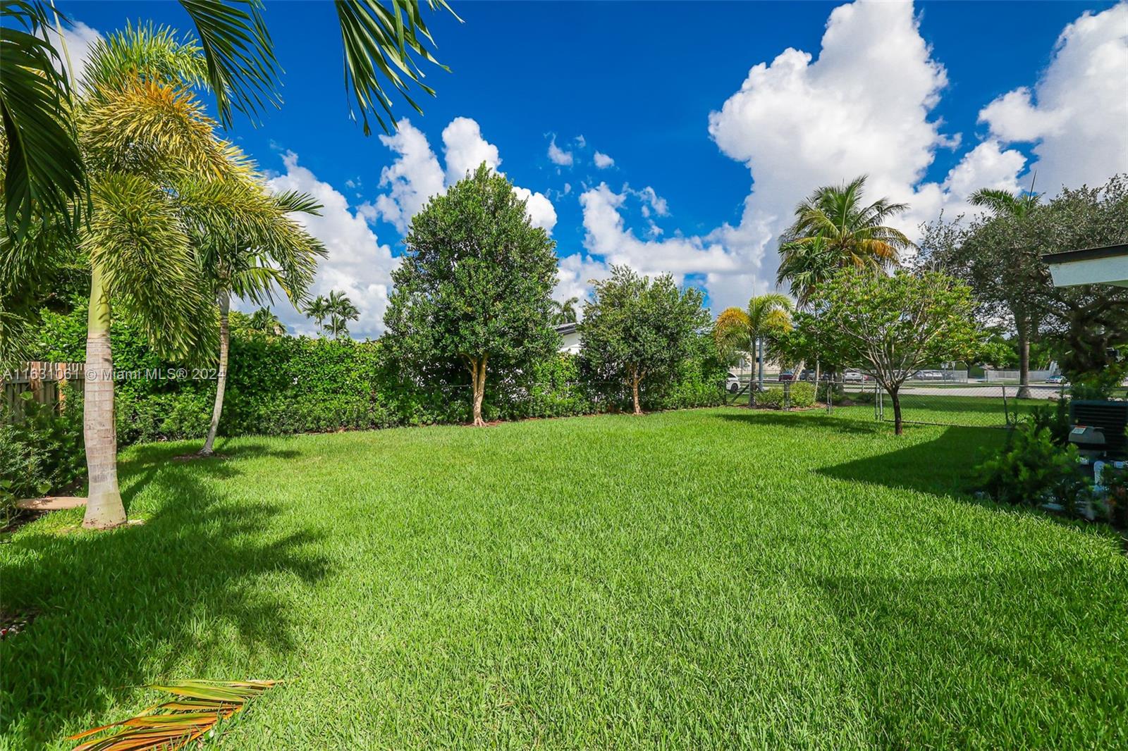 10900 Southwest 128th Street Miami, FL 33186 - Photo 12 of 34 a view of a yard with a fountain