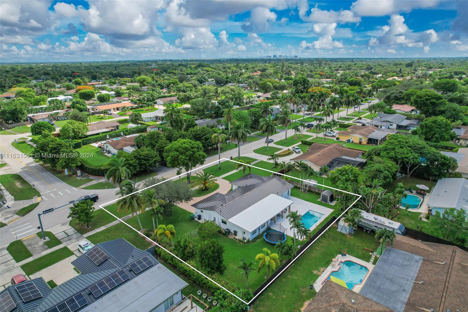 10900 Southwest 128th Street Miami, FL 33186 - Photo 7 of 34 an aerial view of a house with a yard