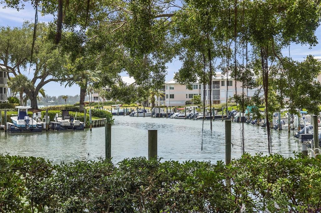 11000 Placida Road, Unit 302 Placida, FL 33946 - Photo 41 of 68 a view of a lake with houses